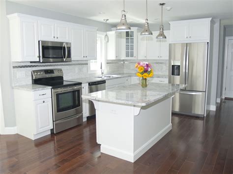 pictures of white cabinets with stainless steel appliances|white appliances with stainless accents.